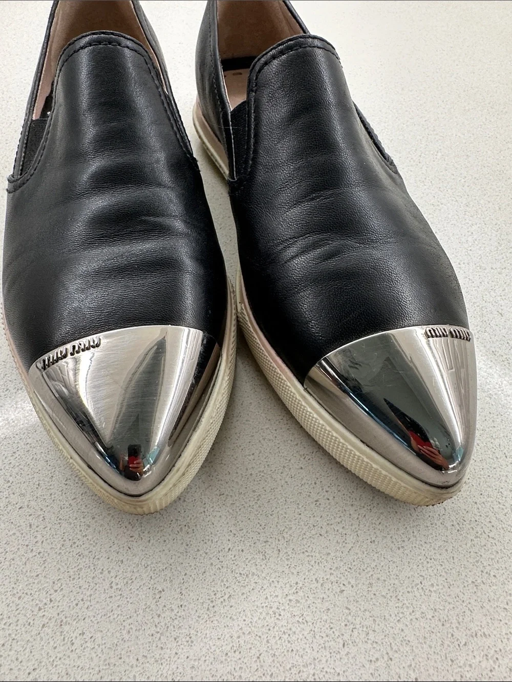 Miu Miu Black Leather Slip-On Flats with Silver Cap Toe